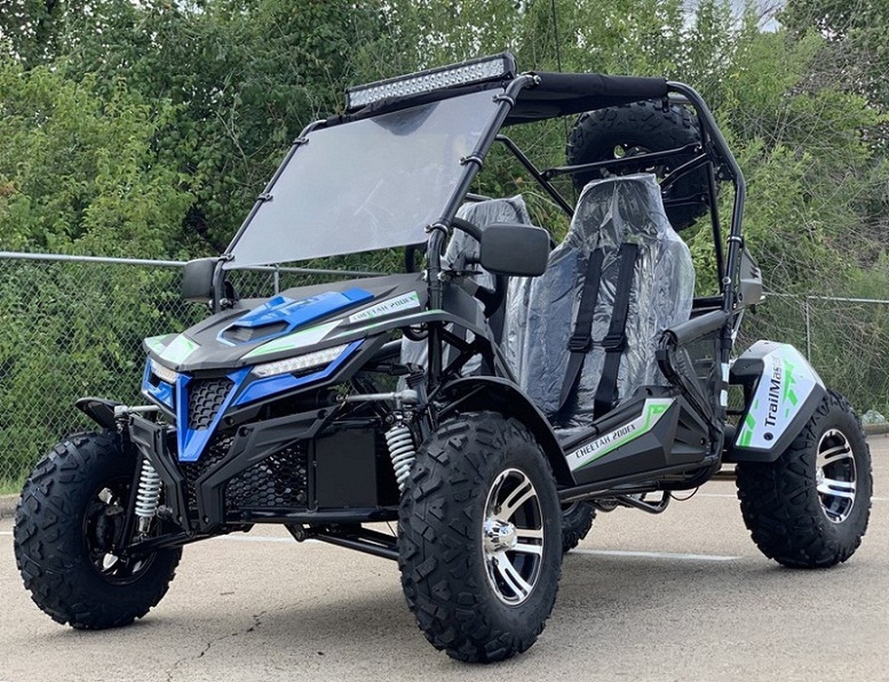 Trailmaster Cheetah 200EX Off Road UTV / Go Kart / side-by-side Wind Shield, Light bar, Spare Tire, Upgraded Center Pivot rear end, Fuel Injected Left Side View