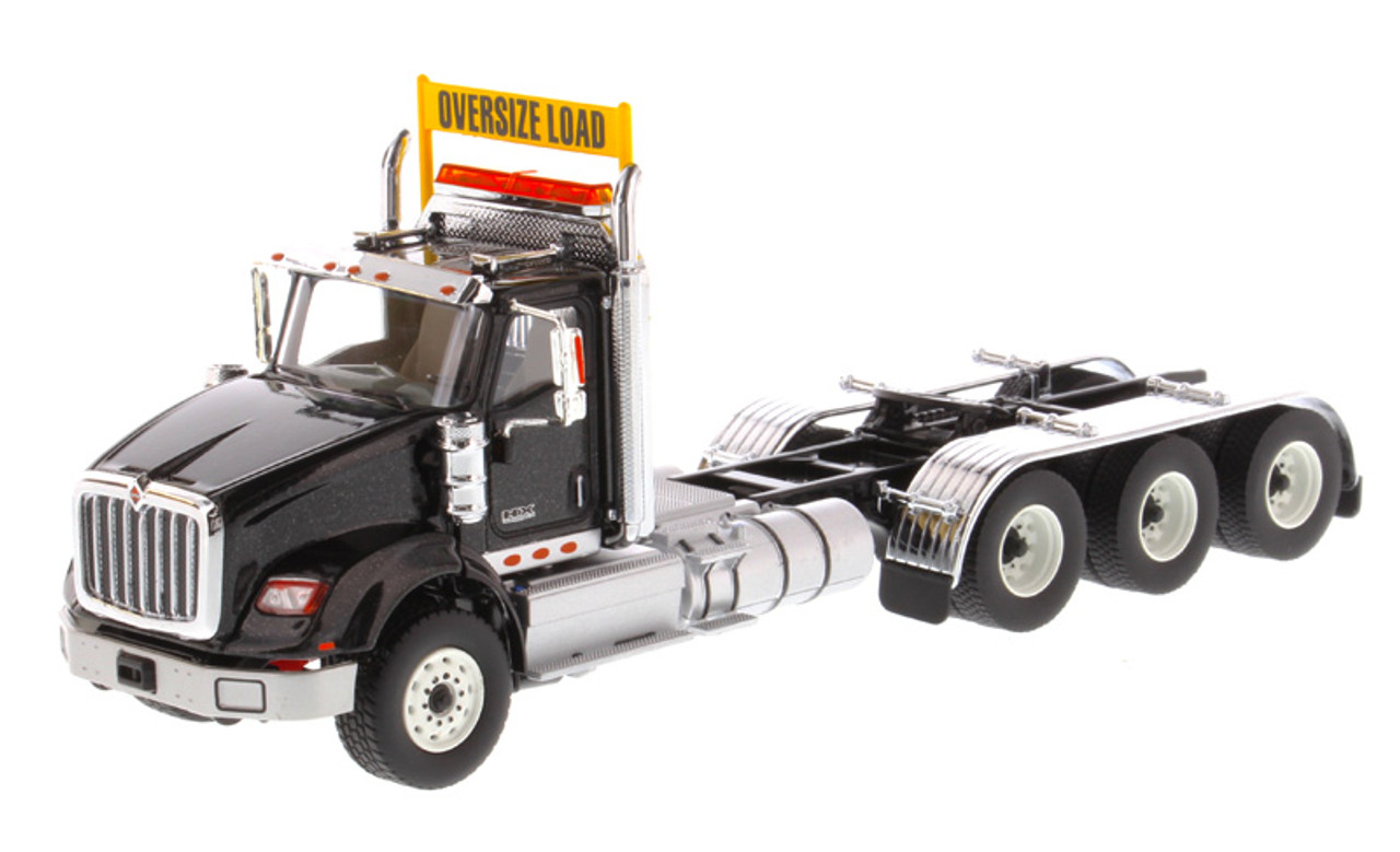 Diecast Masters International HX620 Day Cab Tridem Tractor in Metallic Black - Cab Only  1/50 71009