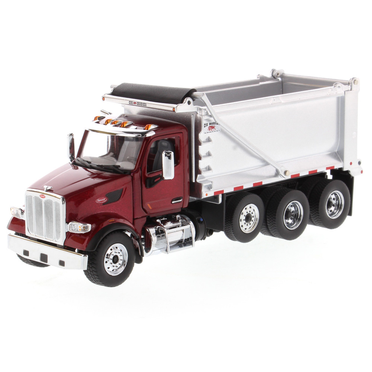 Diecast Masters Peterbilt 567 Tandem Truck with Pusher Axle in Metallic Red with Ox Bodies Stampede Dump Bed 1/50 71077