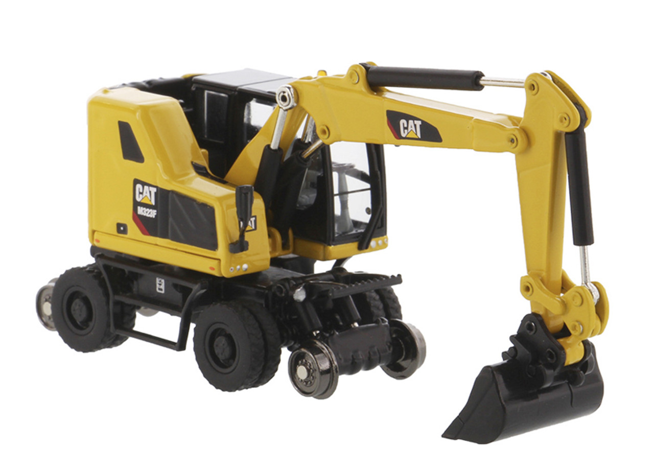 Diecast Masters Caterpillar M323F Railroad Wheeled Excavator with 3 Accessories 1/87 85612