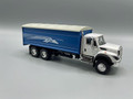 Greenlight International Workstar in White with Blue Grain Bed with Graphic 51370-A 1/64 Scale