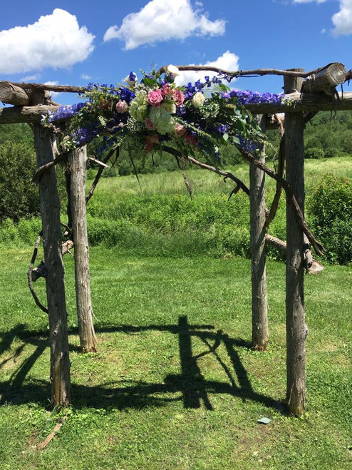 The arch at the Mansfield Barn. Installation of overhead piece.