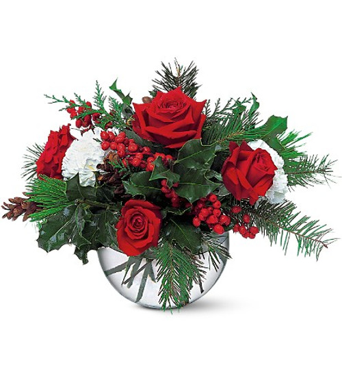 Beautiful bowl of Red roses, white carnations, and the scent of winter greens through out.