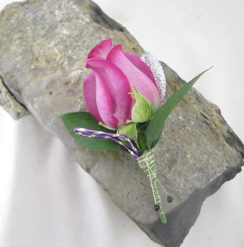 Silver and Shine with this purple rose with silver wire wrapped stems. Available in many color choices. Call us today and we can help you make the right choice.  Chappell's Florist 802-658-4733