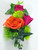 Chic and Stunning Lapel flowers. Make him stand out above the rest. Combination of orange and hot pink miniature spray roses with green ivy. An exclusive design by Chappell's Florist