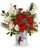 Teleflora's Woodland Cardinal Bouquet is a festive winter favorite! Red roses and carnations are hand-arranged with white blooms, pine, and holly in Teleflora's Woodland Cardinal Crock. A classic Christmas arrangement that brings seasonal color and charm to any space.