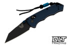 Benchmade 290BK Immunity equipped with striking Crater Blue aluminum handles, protective black blade coating, and grip-extending lanyard system. Benchmade 290BK Immunity equipped with striking Crater Blue aluminum handles, protective black blade coating, and grip-extending lanyard system.