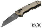 Benchmade Immunity with FDE handles and coated blade.