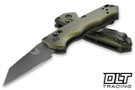 Woodland Green Benchmade Immunity 2900BK-2 folding knife with black coated blade.