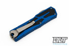 Heretic Colossus S/E Stonewash Serrated - Blue Handle - MagnaCut