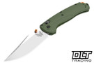 Benchmade Taggedout Folding knife with AXIS Lock, satin blade, and green handles. Benchmade Taggedout Folding knife with AXIS Lock, satin blade, and green handles.