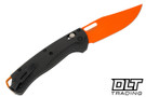 Benchmade Taggedout with carbon fiber handles and a orange coated blade. Benchmade Taggedout with carbon fiber handles and a orange coated blade.