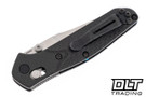 Benchmade 954 Mini Osborne with S90V blade and carbon fiber handles, folded, showing pocket clip.