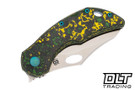 Olamic Cutlery Busker Semper - Satin MagnaCut Blade - Toxic Storm Fat Carbon - Frosty Titanium - Green Backspacer & Accents - 675