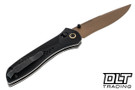 Benchmade Seven Ten folding knife with black handle and tan coated blade.