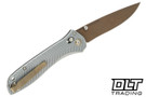 Benchmade 710 folding knife with gray aluminum handle and tan coated blade.