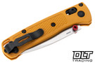 Benchmade 533-08 Mini Bugout with Daybreak yellow handles and satin blade shown closed with pocket clip.