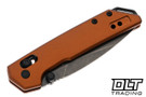 Kershaw Mini Iridium 2051BRZBW with bronze handles and a blackwashed blade shown folded. 