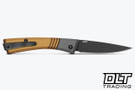 Benchmade Successor 315BK-01 with 2.56" M390 DLC blade and burnt brass aluminum handles. A USA-made modern slip joint is shown open on the clip side.