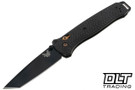 Benchmade 537BK-10 Bailout folding knife with Carbon Fiber handles and gold hardware with a black S90V Tanto blade