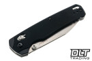 Kershaw Bel Air XL 6110 with 3.4" stonewash MagnaCut blade and black G-10 handle. DuraLock crossbar shown folded. 