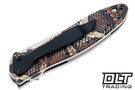 Kershaw Leek with realistic snakeskin UFI coating on aluminum handle. 3" 14C28N bead-blasted blade, SpeedSafe assisted opening.
