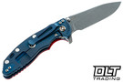 Hinderer 3.5" XM-18 Hollow Ground Slicer 20CV - Battle Blue Anodized Titanium - Working Finish Blade - Red G-10 - Back
