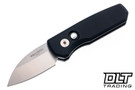 Pro-Tech Runt 5 - Black Handle - Satin MagnaCut Wharncliffe Blade - White Pearl Button