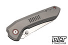 Millit Overland - Zirblast Titanium - Orange Collar & Backspacer - MagnaCut Stonewash Blade