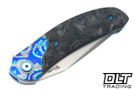 Reate TF-4 M398 Hand Rubbed Satin Blade - Blue Titanium Handle - Zircuti Bolster - Marble Carbon Fiber Inlay
