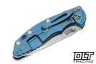 Hinderer 3.5" XM-18 Non Flipper Recurve MagnaCut - Blue Anodized Titanium - Stonewashed Blade - Orange G-10