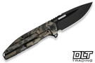 WE Knife Tracks WE23059-3 - Desert Terrain Titanium - Black Stonewash Bevels Black Brushed Flats M390 Blade