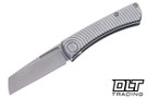 American Blade Works slip joint with a radial-patterned titanium handle and a stonewashed wharncliffe MagnaCut blade, shown open.