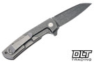 Defiant 7 Servo - Stonewashed Diamond Texture Titanium - Chad Nichols Black Rain Damascus Blade