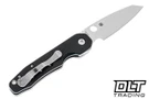 Spyderco Smock with carbon fiber scales and a silver pocket clip. 