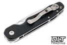 Spyderco Smock with carbon fiber scales shown closed on the pocket clip side. 