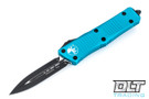 Microtech 138-1TQ Troodon D/E - Turquoise Handle - Black Blade