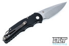 Pro-Tech TR-5 Tactical Response knife with black handles. 