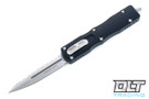 Microtech 225-12 Dirac D/E - Black Handle - Full Serrations - Stonewashed Blade Microtech 225-12 Dirac D/E - Black Handle - Full Serrations - Stonewashed Blade