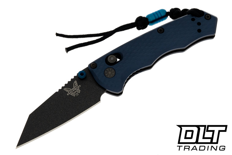 Benchmade 290BK Immunity equipped with striking Crater Blue aluminum handles, protective black blade coating, and grip-extending lanyard system. Benchmade 290BK Immunity equipped with striking Crater Blue aluminum handles, protective black blade coating, and grip-extending lanyard system.