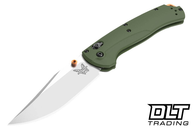 Benchmade Taggedout Folding knife with AXIS Lock, satin blade, and green handles. Benchmade Taggedout Folding knife with AXIS Lock, satin blade, and green handles.