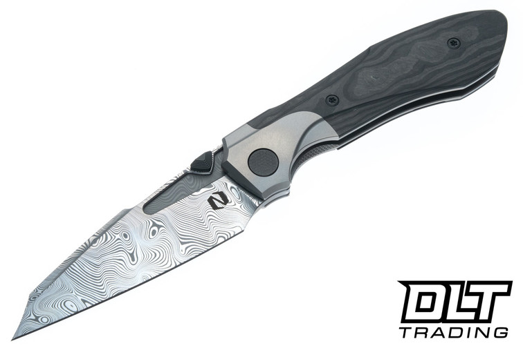 Null Voodoo Doll - Glass Bead Blast Titanium Bolster - Black Camo Carbon Fiber - Bjorkman's Twist Acidwash Damasteel Blade