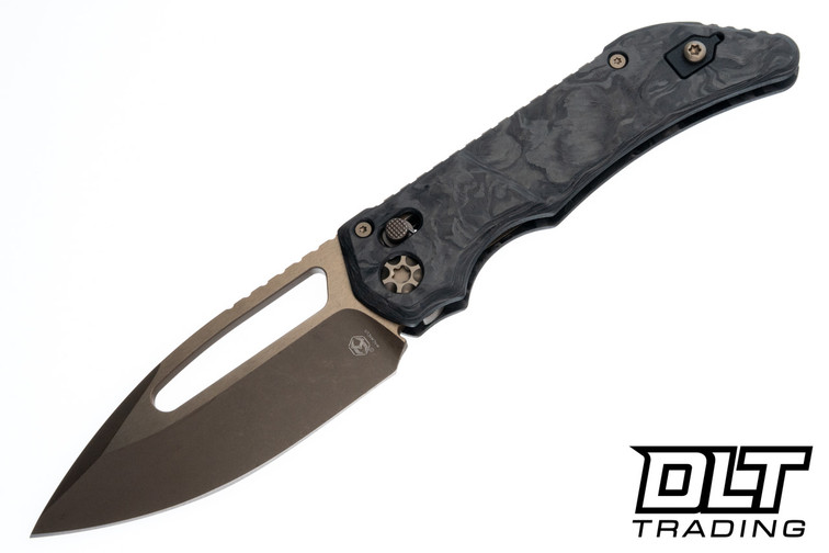 Heretic Koschei - Bronze MagnaCut Blade - Bronze Hardware - Marble Carbon Fiber Chassis