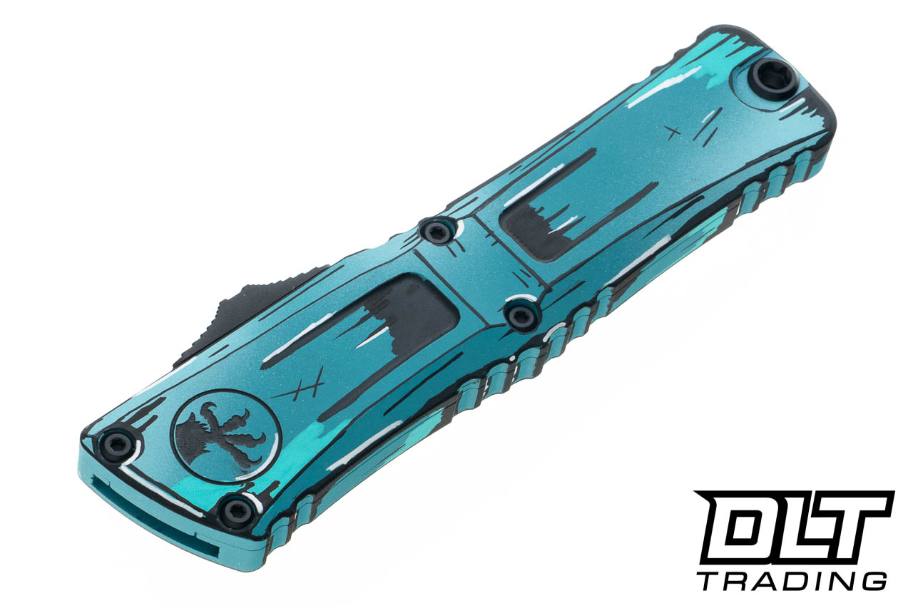 Microtech 1142-1TQCOMICS Combat Troodon Gen III - Turquoise Comic