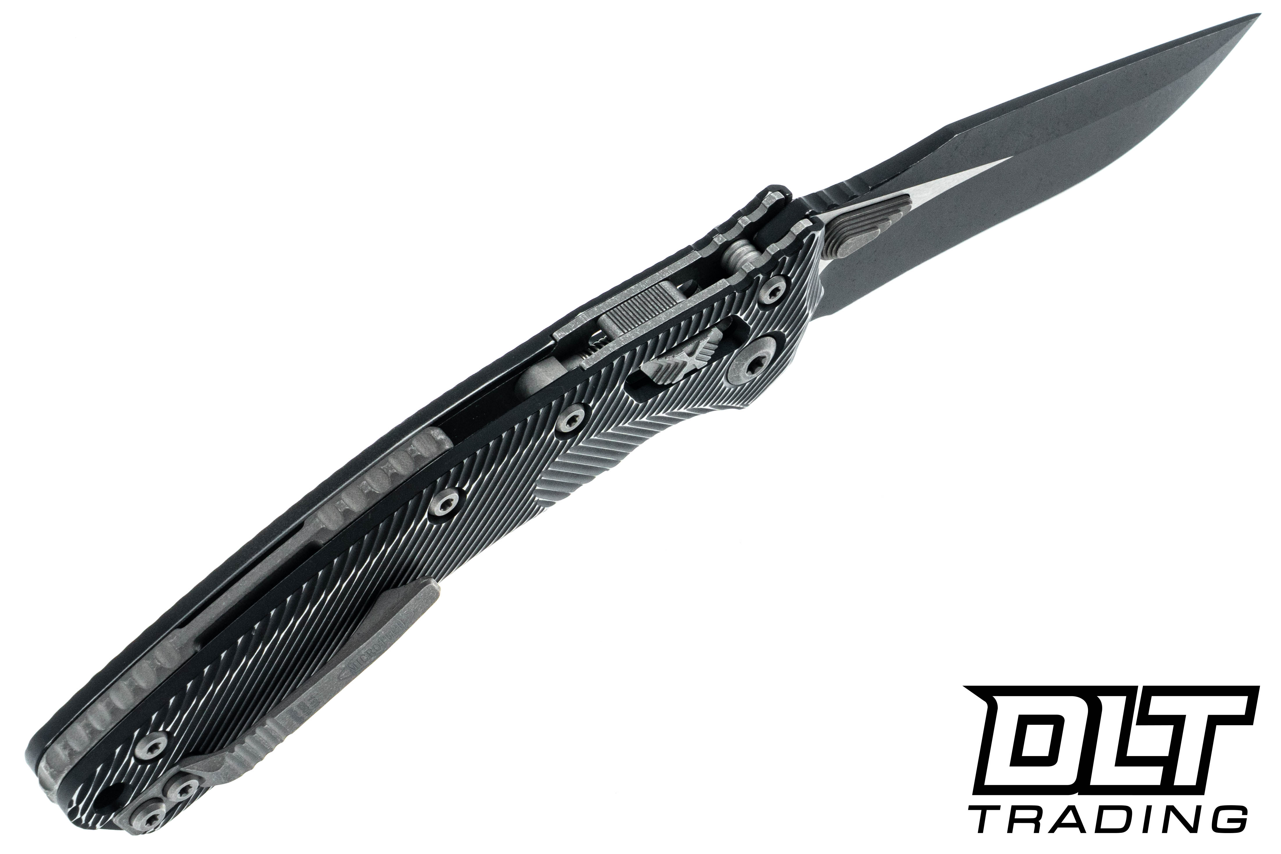 Microtech 137RL-1FLDBK Amphibian Ram-Lok - Distressed Black Fluted 