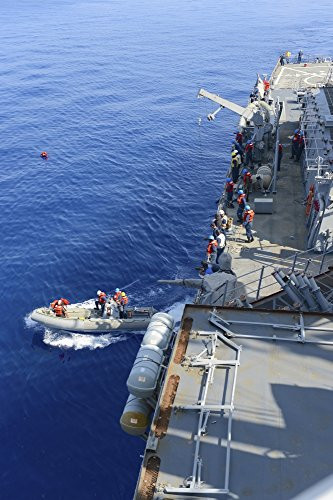 Posterazzi Sailors execute rescue operations in a rigid-hull inflatable boat Poster Print  -11 x 17-