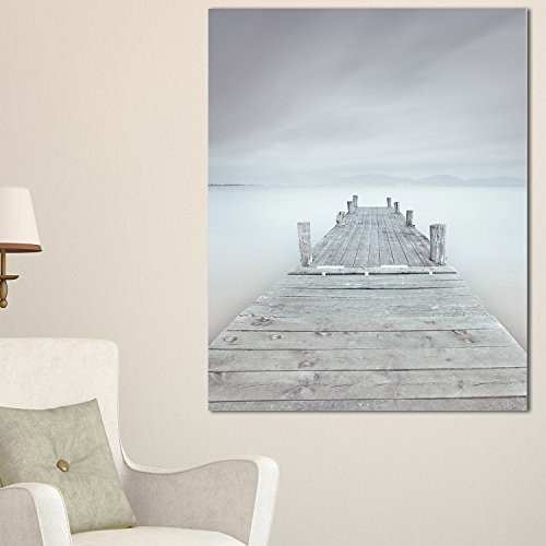 Designart PT8357-20-40 Wooden Pier in Cloudy Mood Seascape Photo Canvas Print 20x40 Blue