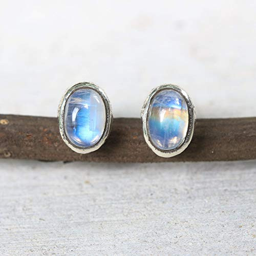 Tiny oval cabochon moonstone earrings in silver bezel setting with sterling silver post and backing