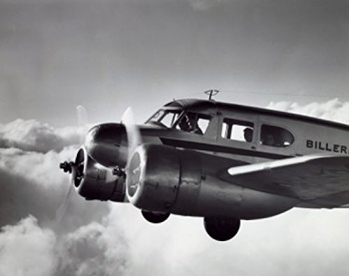 Posterazzi Low angle view of an aircraft in flight Twin Engine Cessna Poster Print -18 x 24- Posterazzi Low angle view of an aircraft in flight Twin Engine Cessna Poster Print -18 x 24-