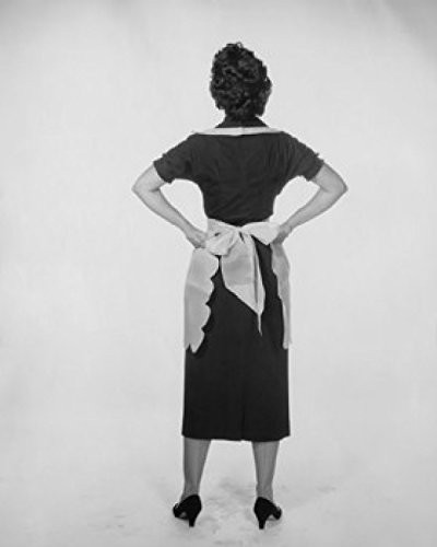 Posterazzi SAL25542060 Studio shot of young woman standing with arms akimbo Poster Print  18 x 24